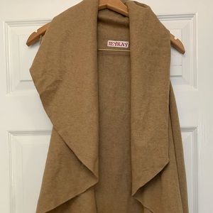 Woman’s camel colored long fluttered vest